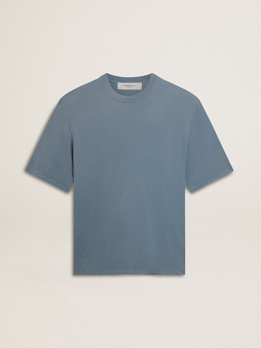 unisex katoenen t-shirt in lichtblauw met omgekeerde print op de achterkant.