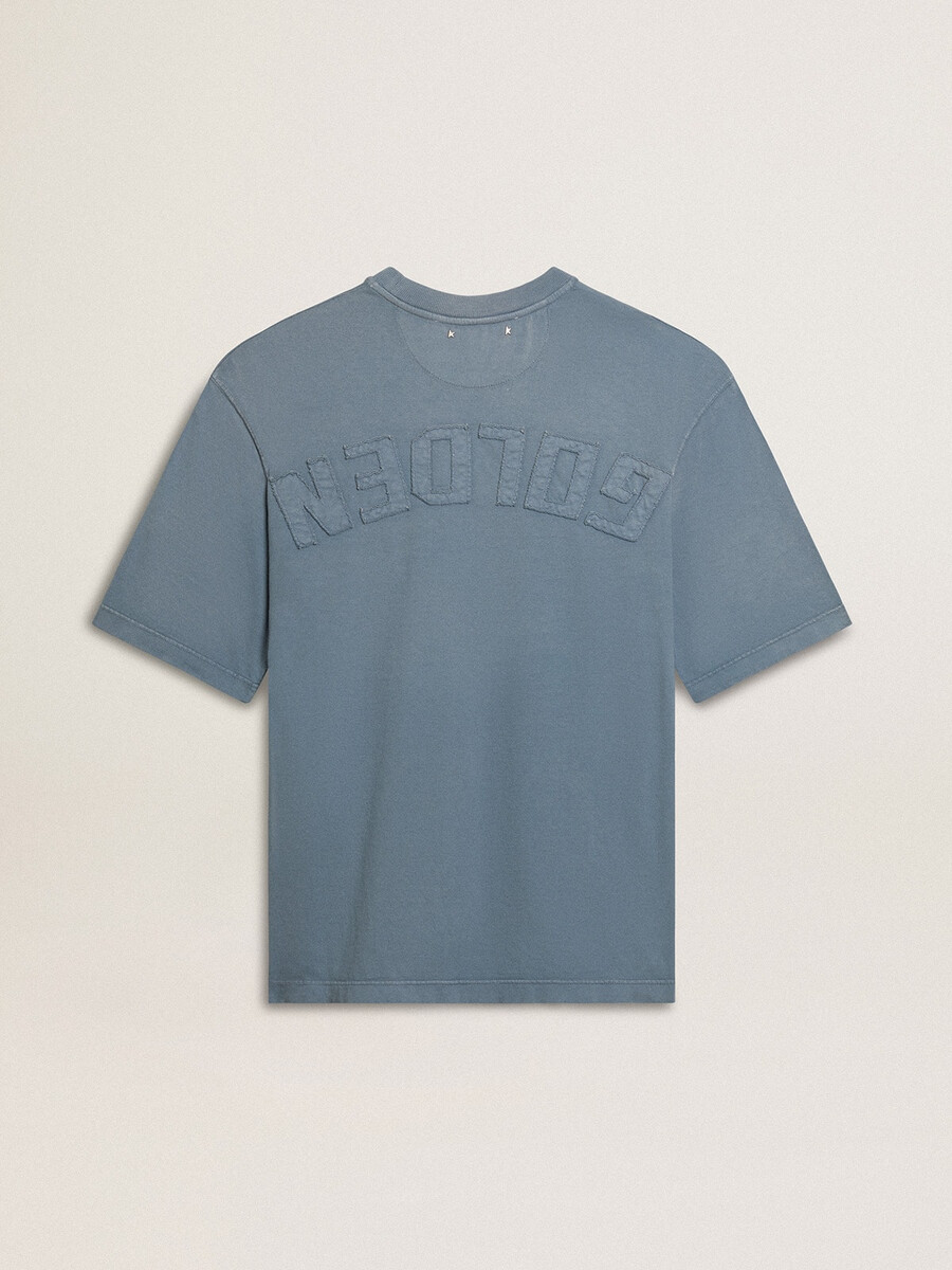 unisex katoenen t-shirt in lichtblauw met omgekeerde print op de achterkant.