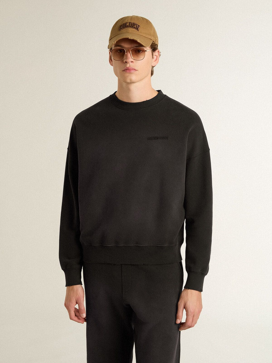 unisex sweatshirt van verwassen zwart katoen met logo-borduurwerk.