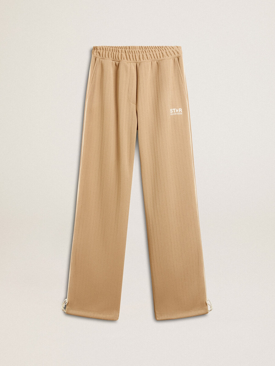 damesjoggingbroek in lichtbeige met wit logo