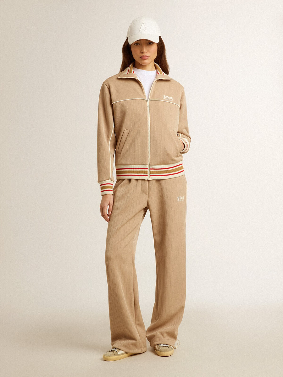 damesjoggingbroek in lichtbeige met wit logo