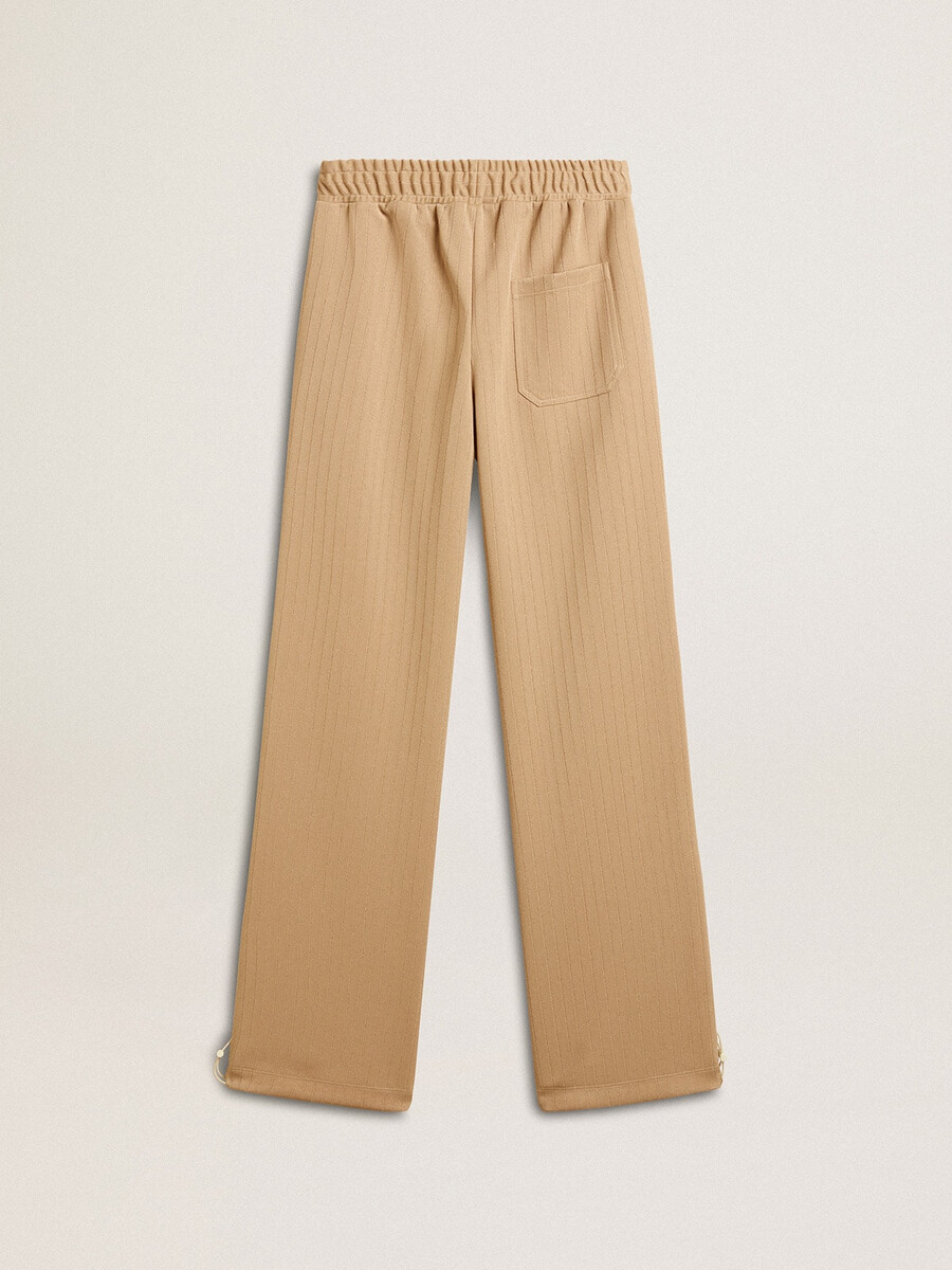 damesjoggingbroek in lichtbeige met wit logo