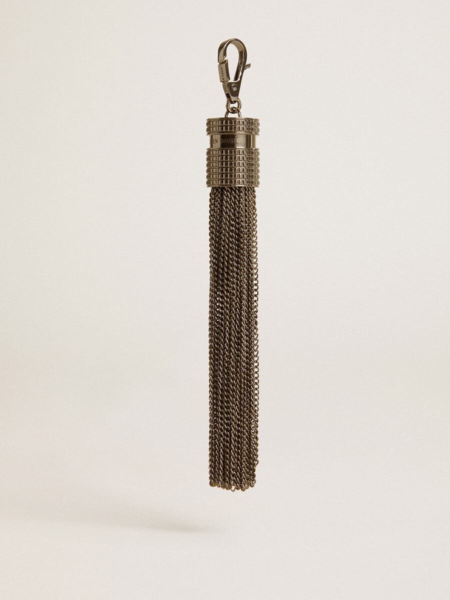 kwastje-vormige hanger van zilverkleurig messing met kristallen.