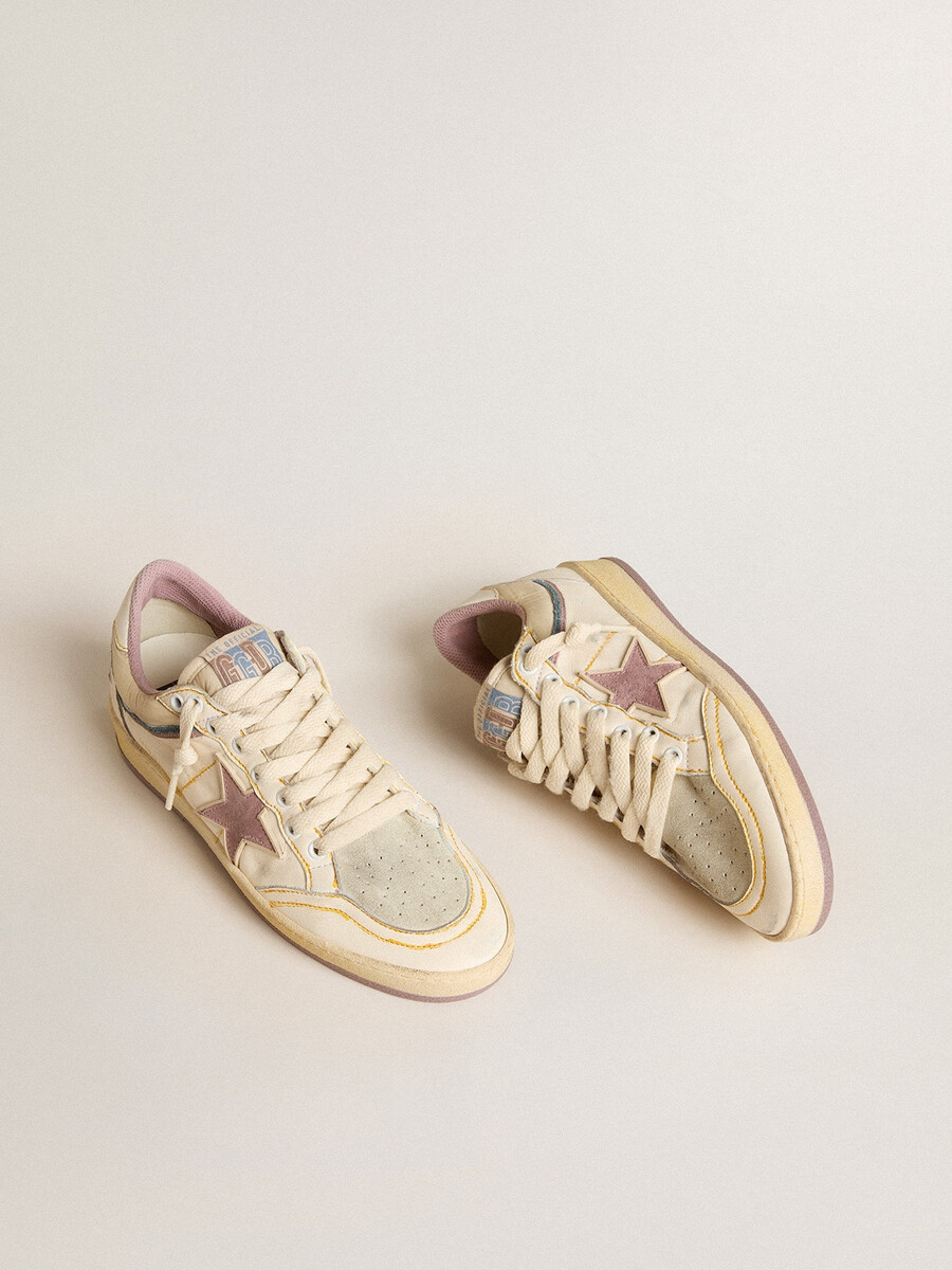 damesballerina in nappaleer met mauve tpu-ster en leren hielstuk.