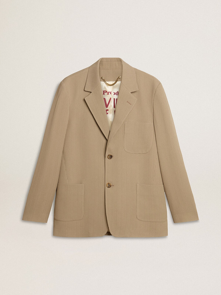 beige herenjas met krijtstreep enkele rij knopen en een oversized pasvorm.