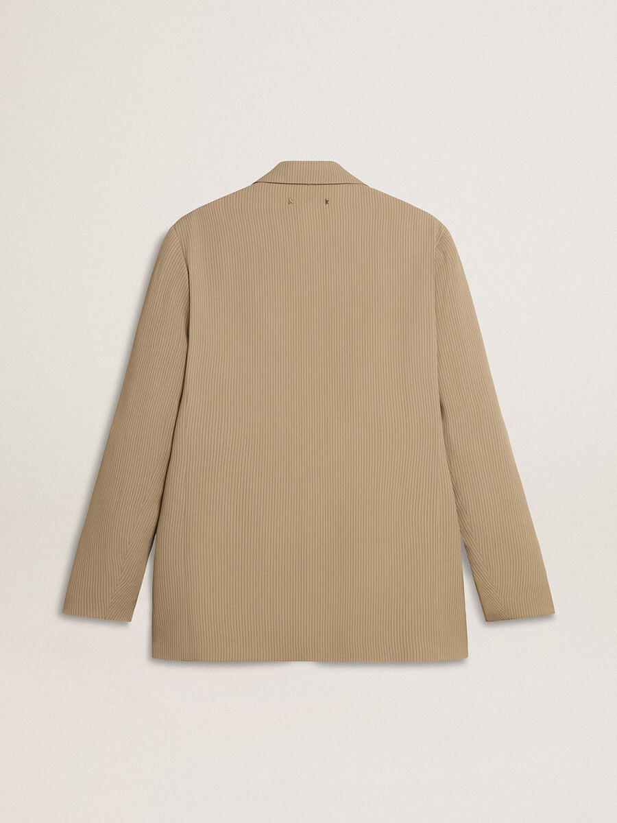 beige herenjas met krijtstreep enkele rij knopen en een oversized pasvorm.