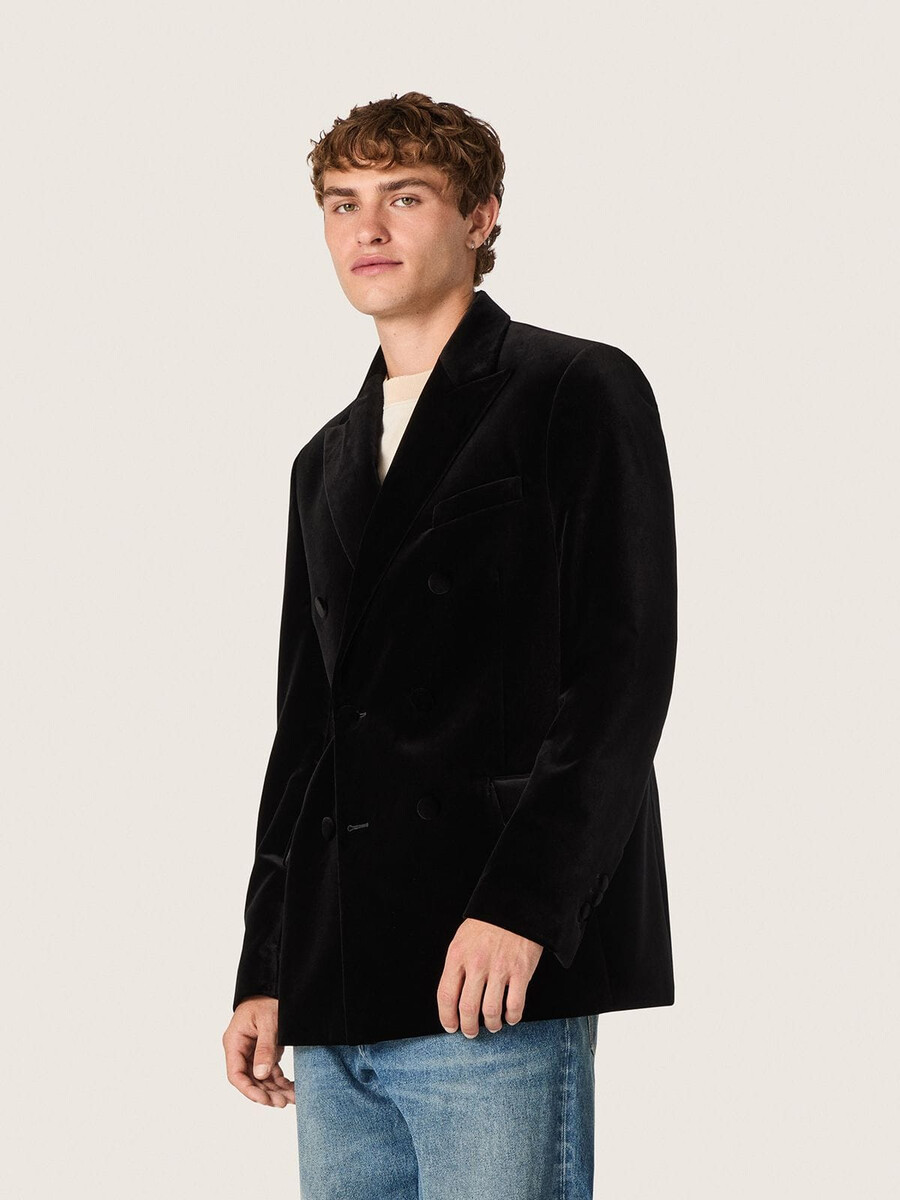 dubbelknoops herenblazer van zwart fluweel met zwarte satijnen revers.