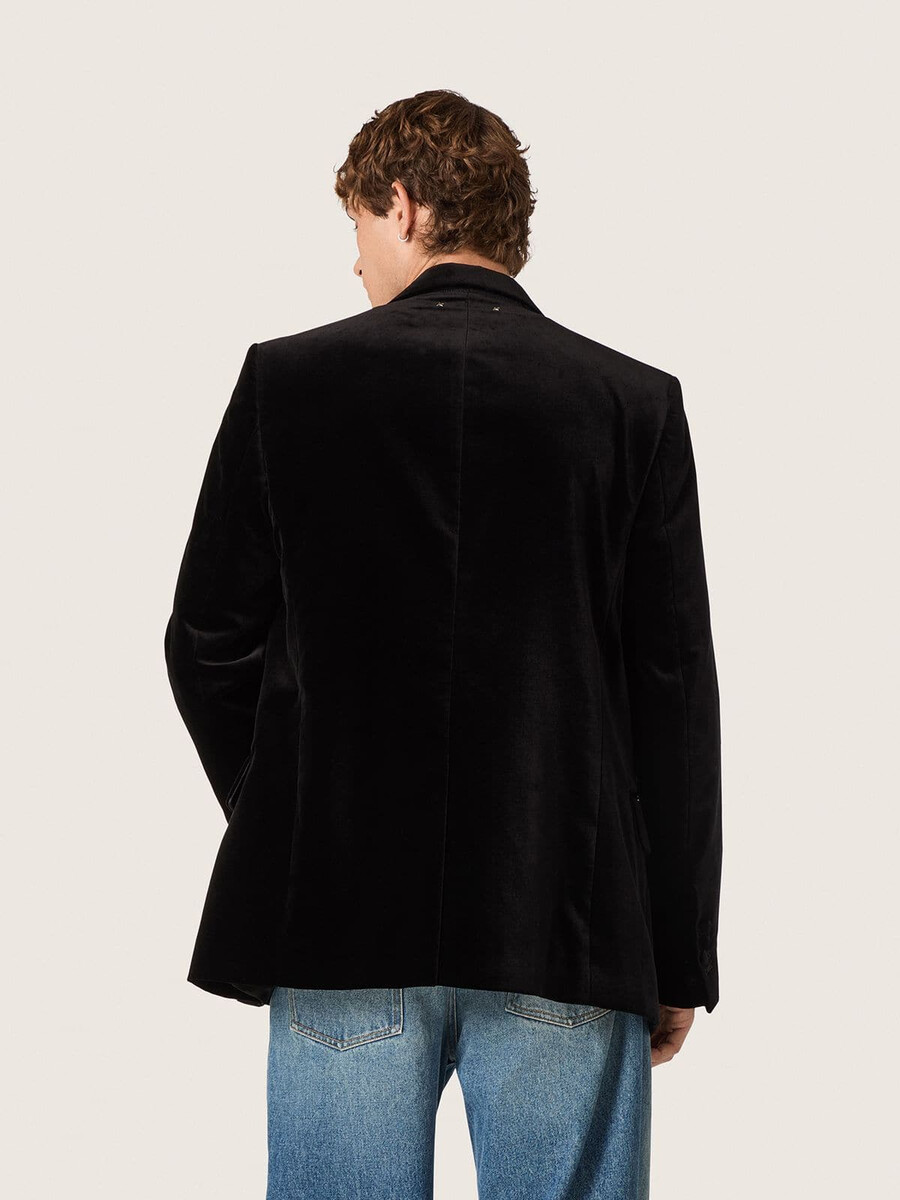 dubbelknoops herenblazer van zwart fluweel met zwarte satijnen revers.