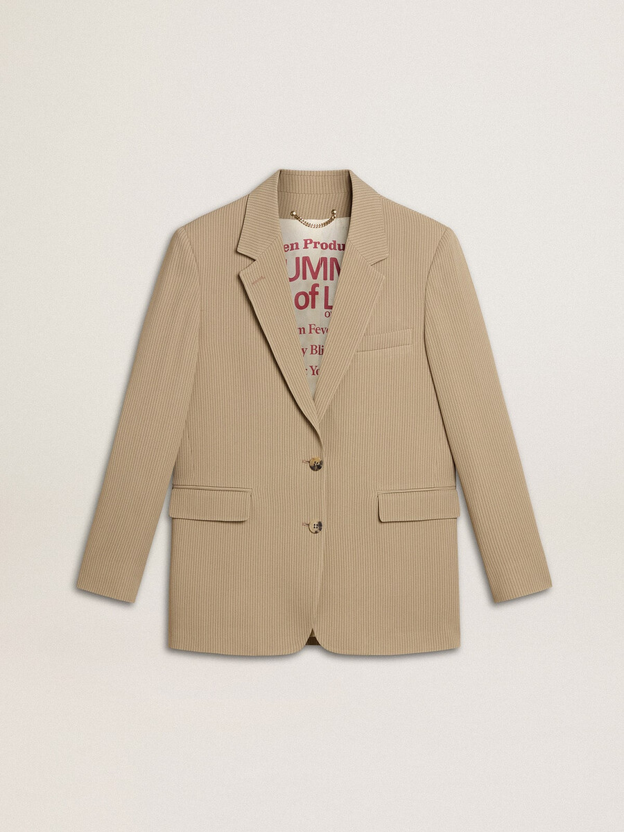 beige damesjasje met krijtstreepjes en enkele rij knopen met een oversized pasvorm.