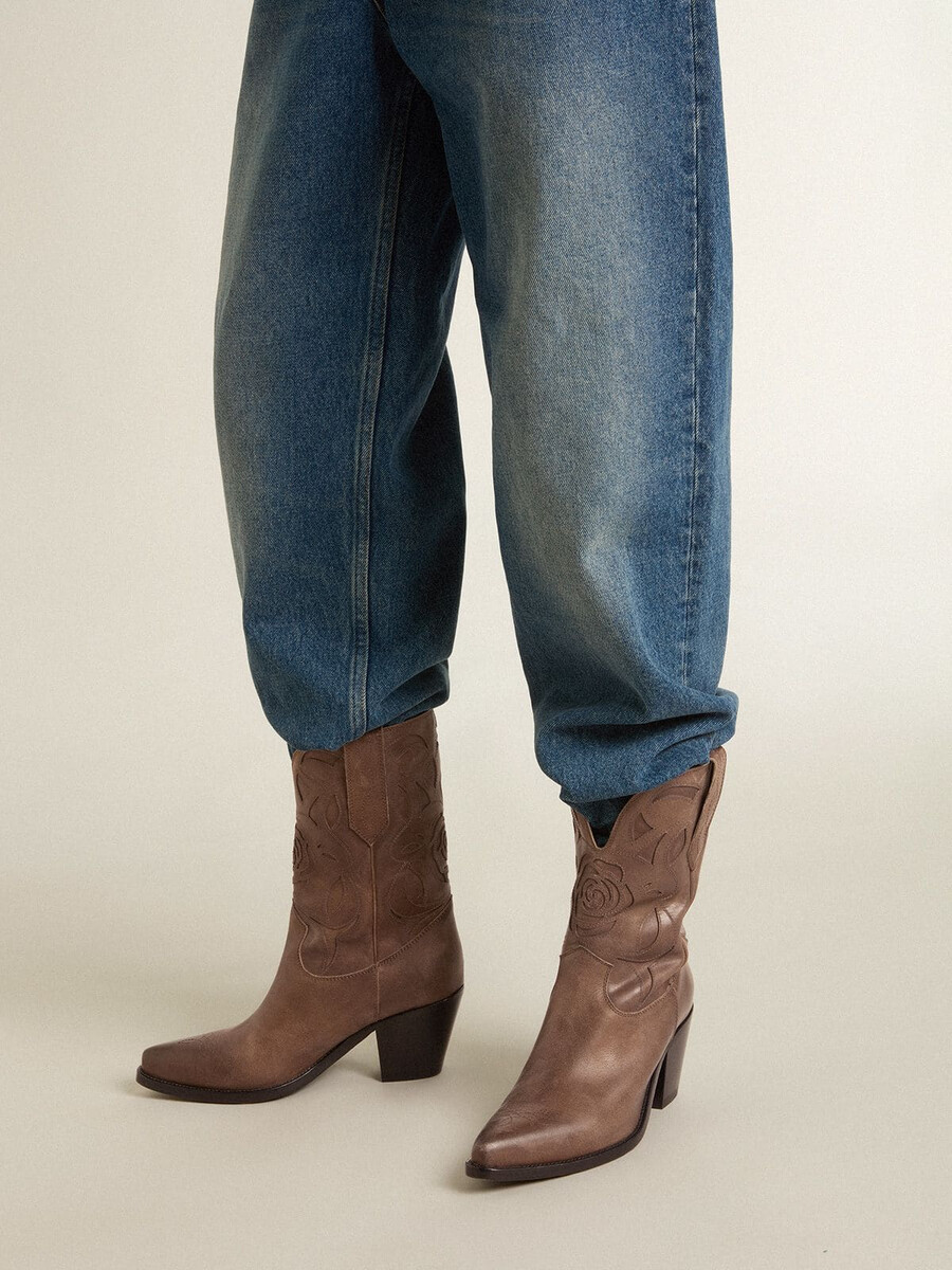wish star laarzen van duifgrijs leer met ton-sur-ton inlegdetails.