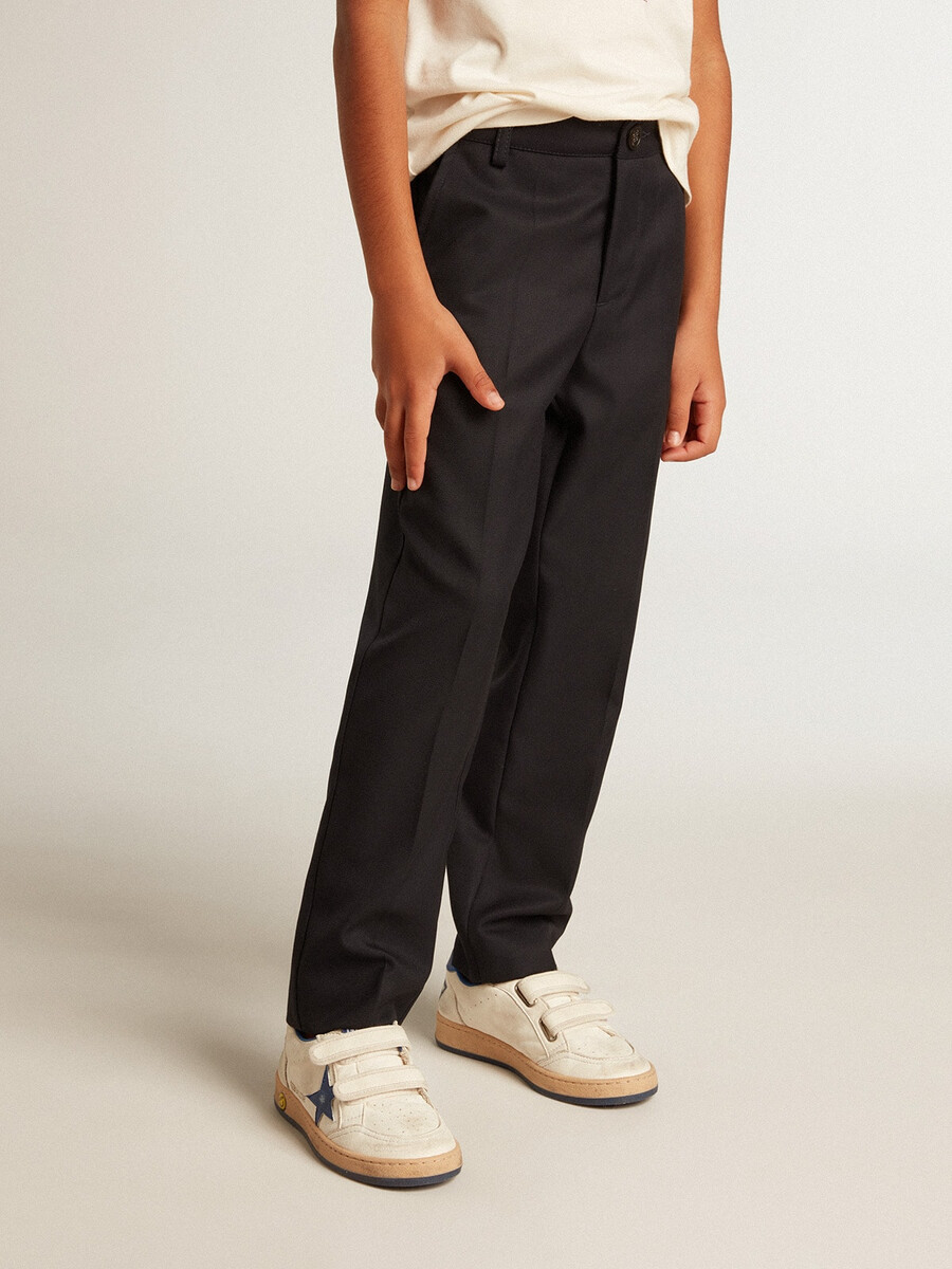 jongensbroek van donkerblauwe wol.