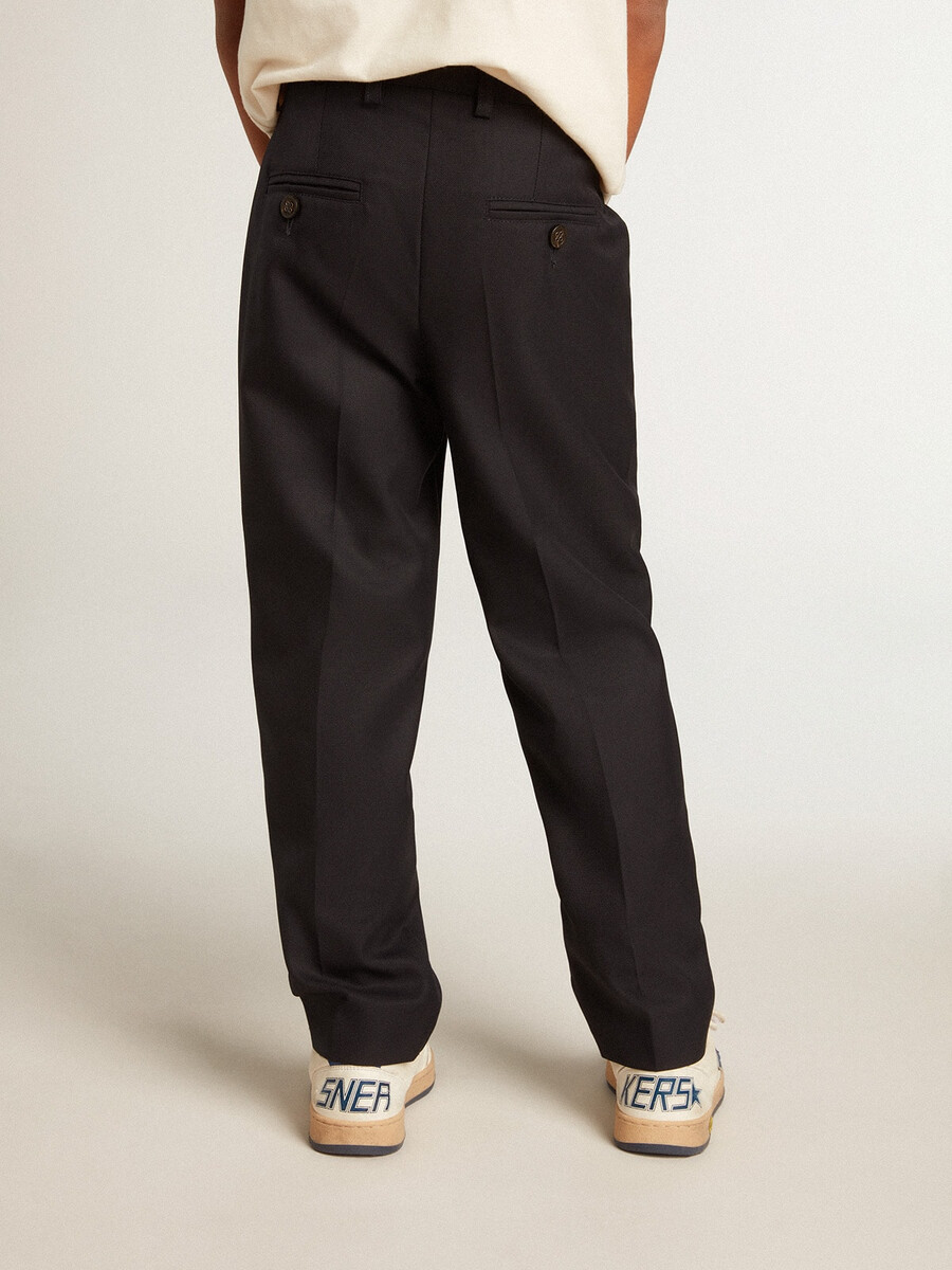 jongensbroek van donkerblauwe wol.