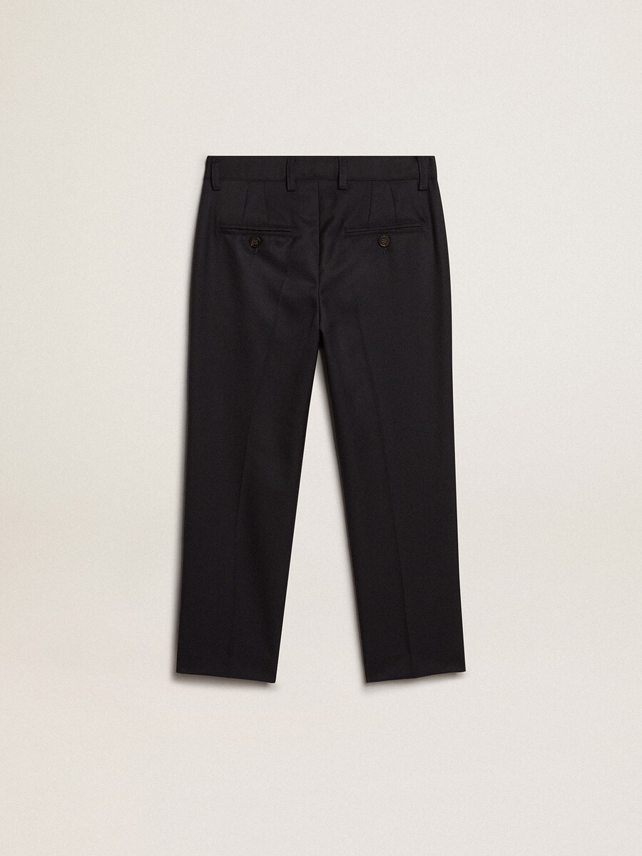jongensbroek van donkerblauwe wol.
