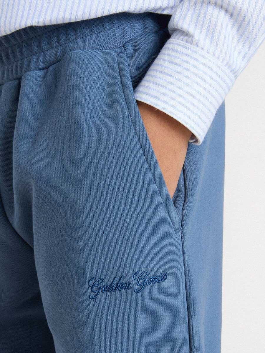 blauwe joggingbroek voor kinderen met borduursel