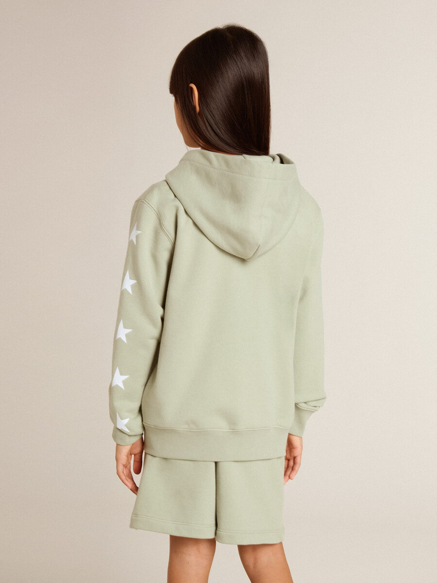 lichtgroene sweater met ritssluiting.