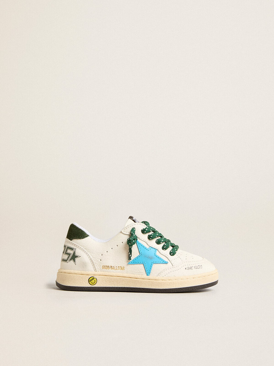 junior ball star met turquoise ster en groene suède hielstuk.