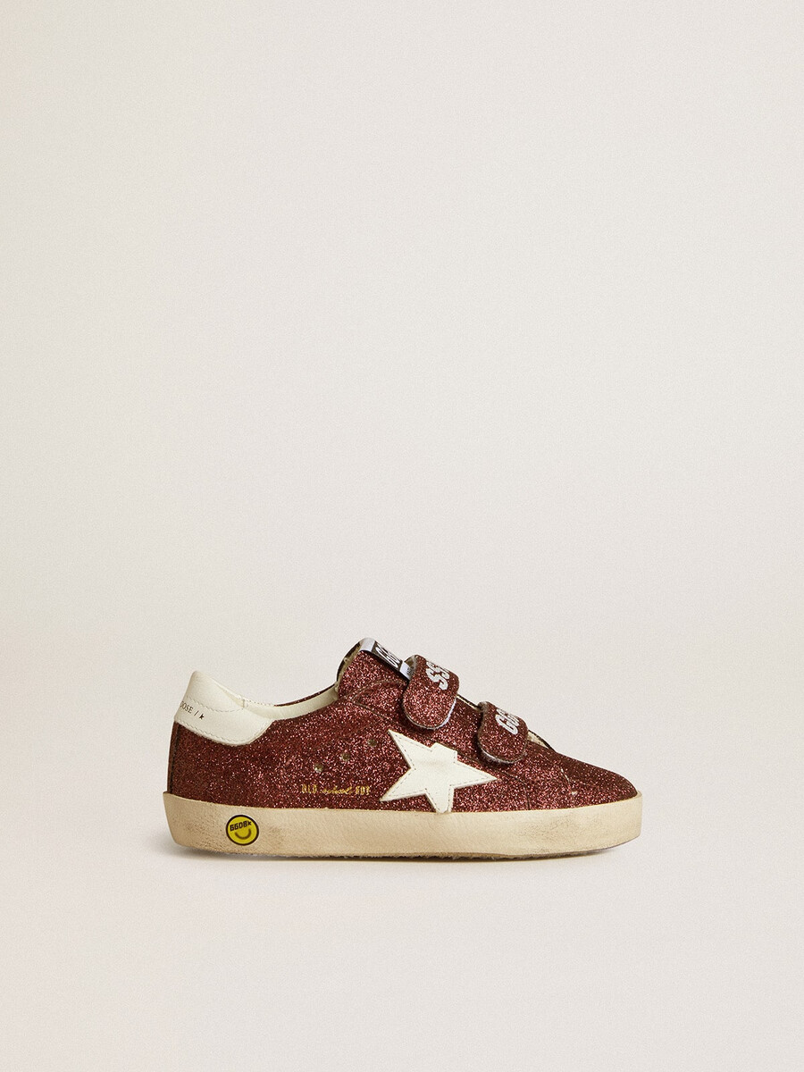 old school junior in bordeauxrode glitter met leren ster en hielstuk.