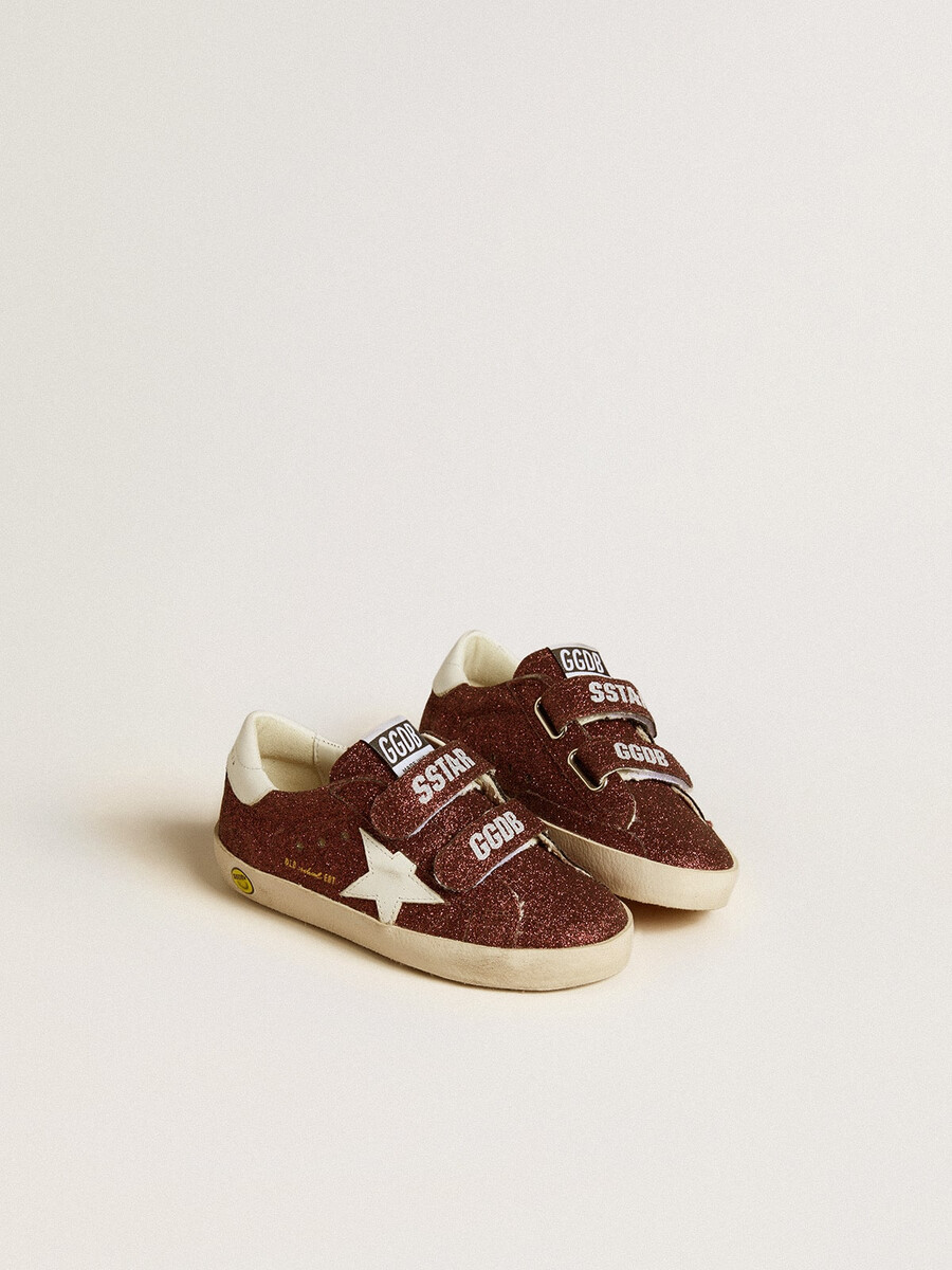 old school junior in bordeauxrode glitter met leren ster en hielstuk.