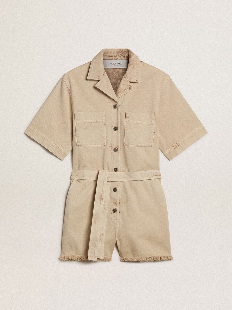 damesjumpsuit van beige denim met riem en gerafelde zoom.