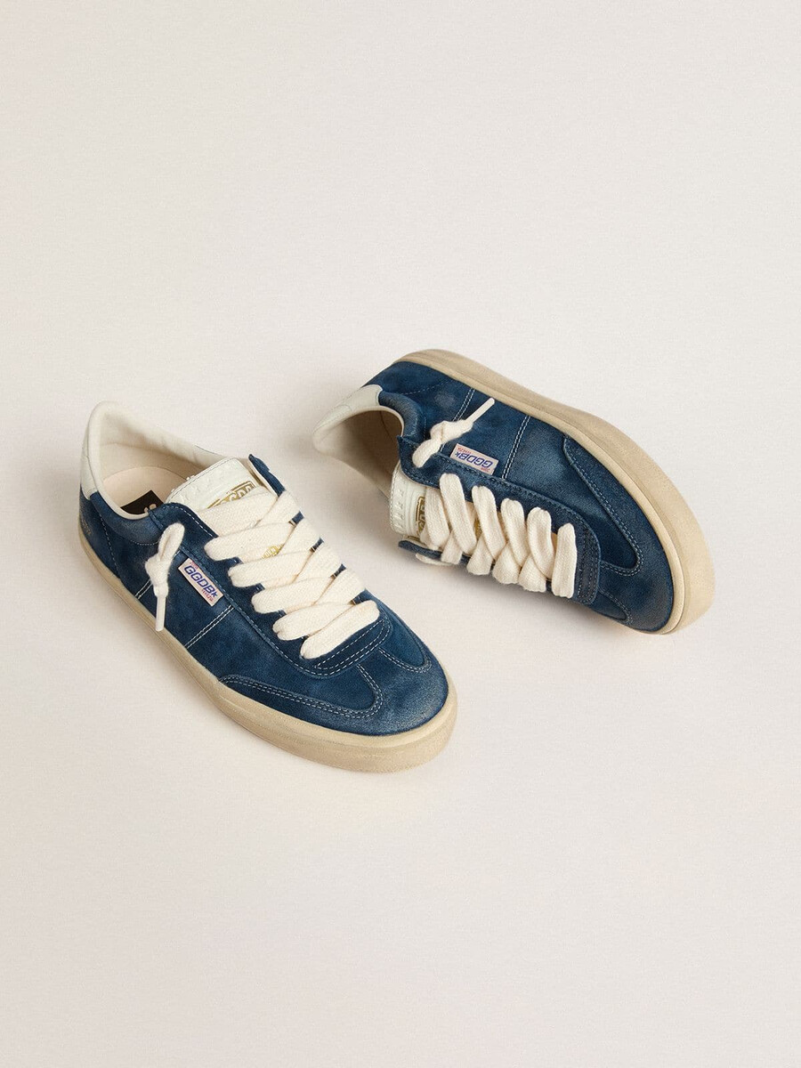 dames soul star in blauw suède met wit leren hielstuk.