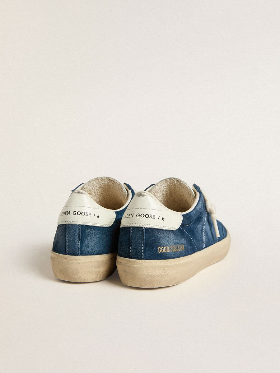 dames soul star in blauw suède met wit leren hielstuk.
