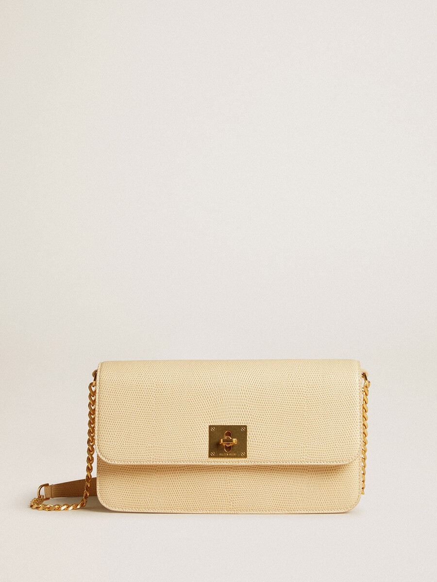 gioia-tas van vanillekleurig schapenleer met gouden details.