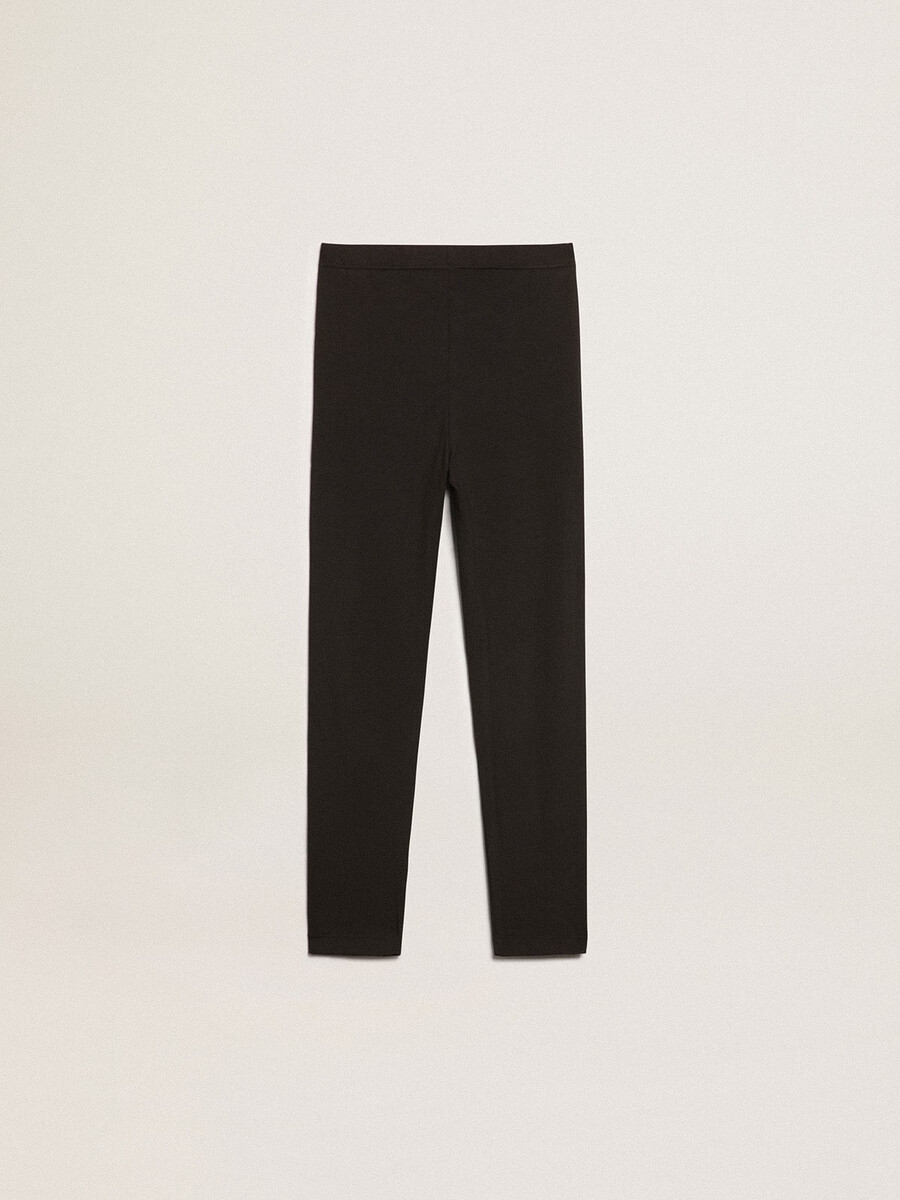 zwarte legging voor meisjes met witte sterren aan de zijkanten.