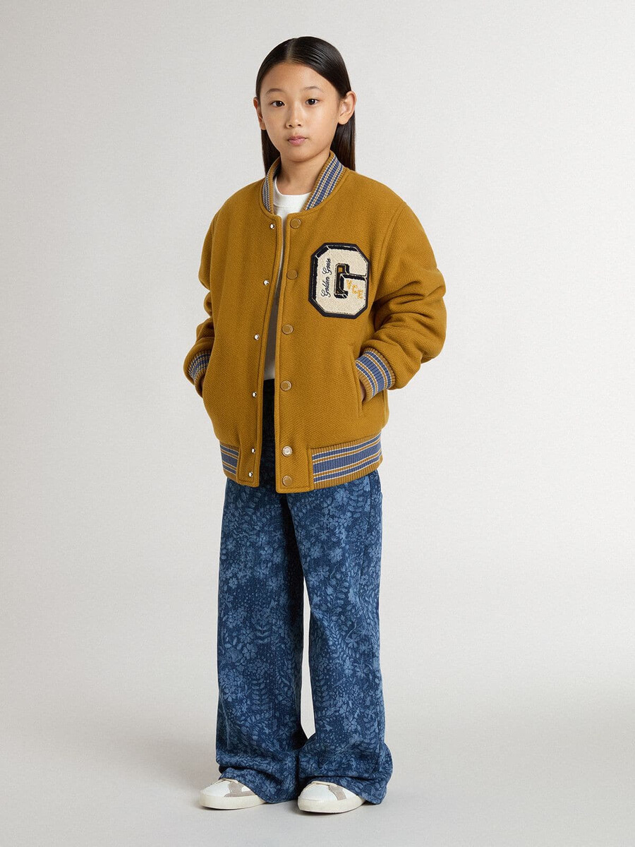 meisjesjeans met wijde pijpen medium wassing en print.