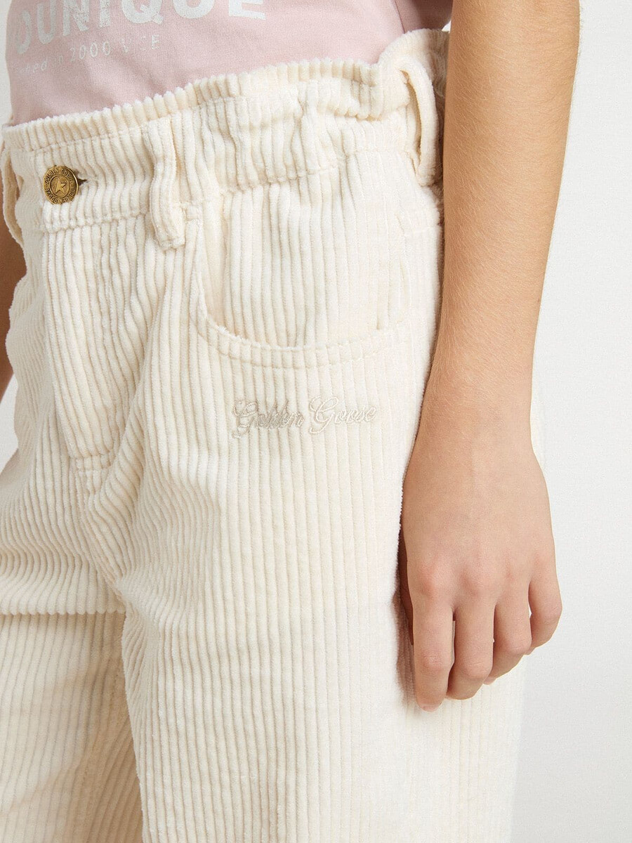crèmekleurige wijde geribbelde broek voor meisjes met borduurwerk.