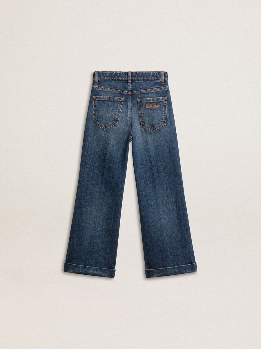 bootcut jeans voor meisjes met een medium wassing en borduurwerk.