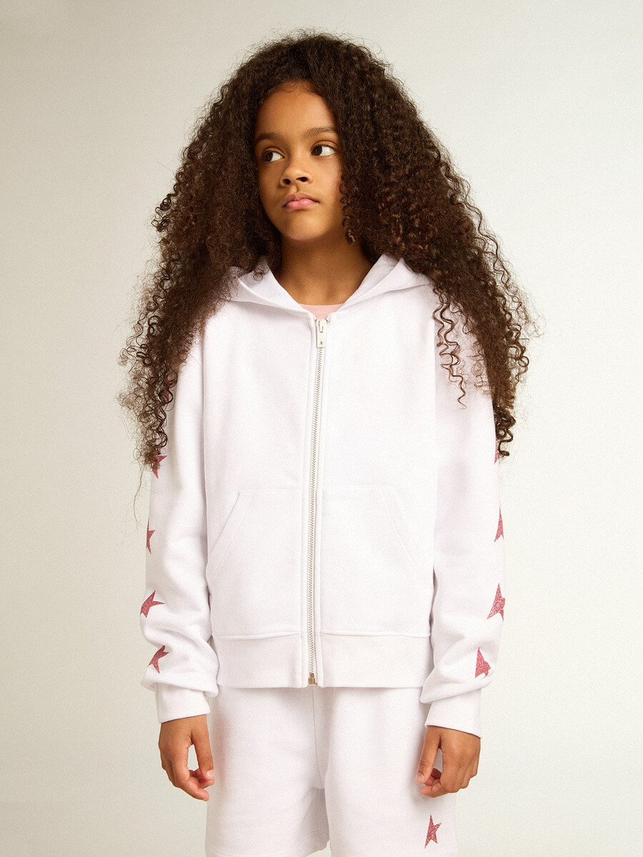 wit sweatshirt met rits voor meisjes versierd met glittersterretjes op de mouwen.