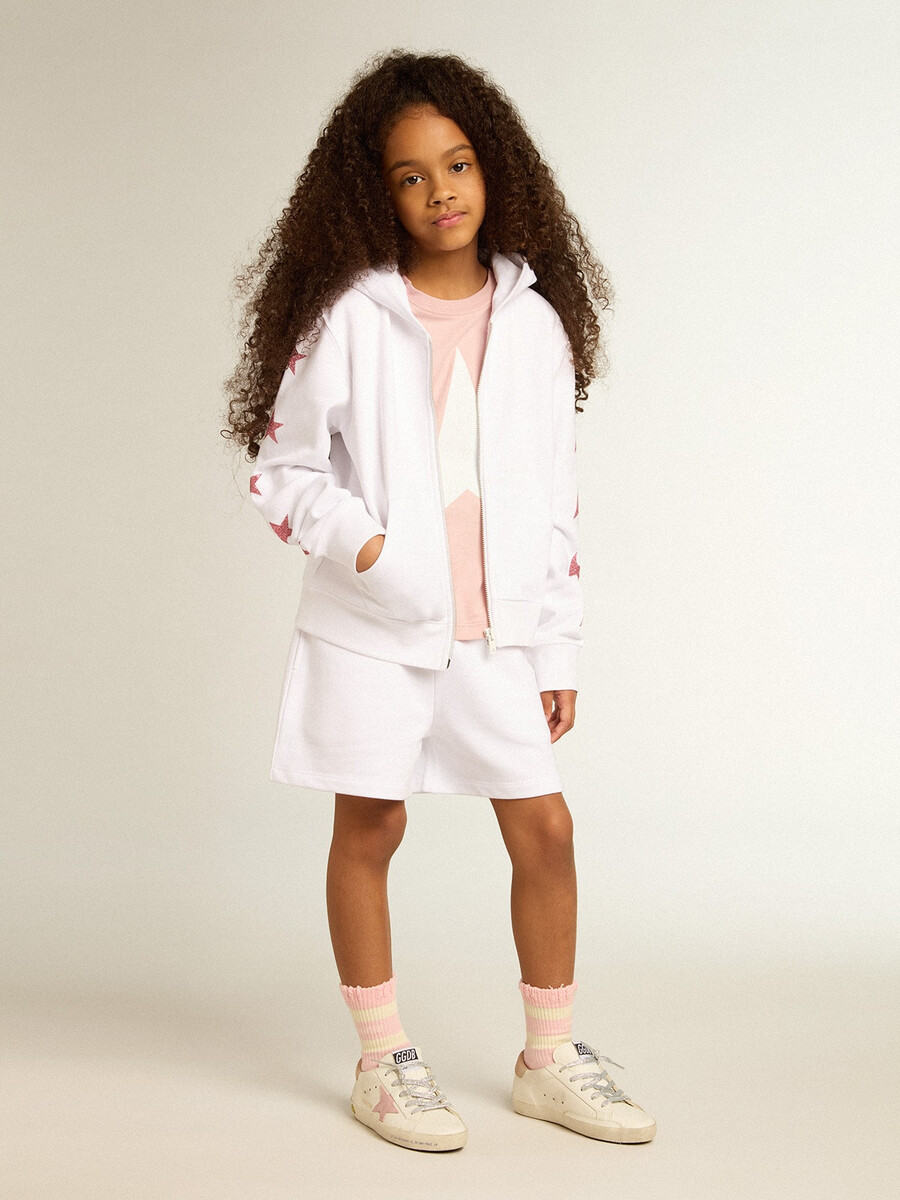 wit sweatshirt met rits voor meisjes versierd met glittersterretjes op de mouwen.