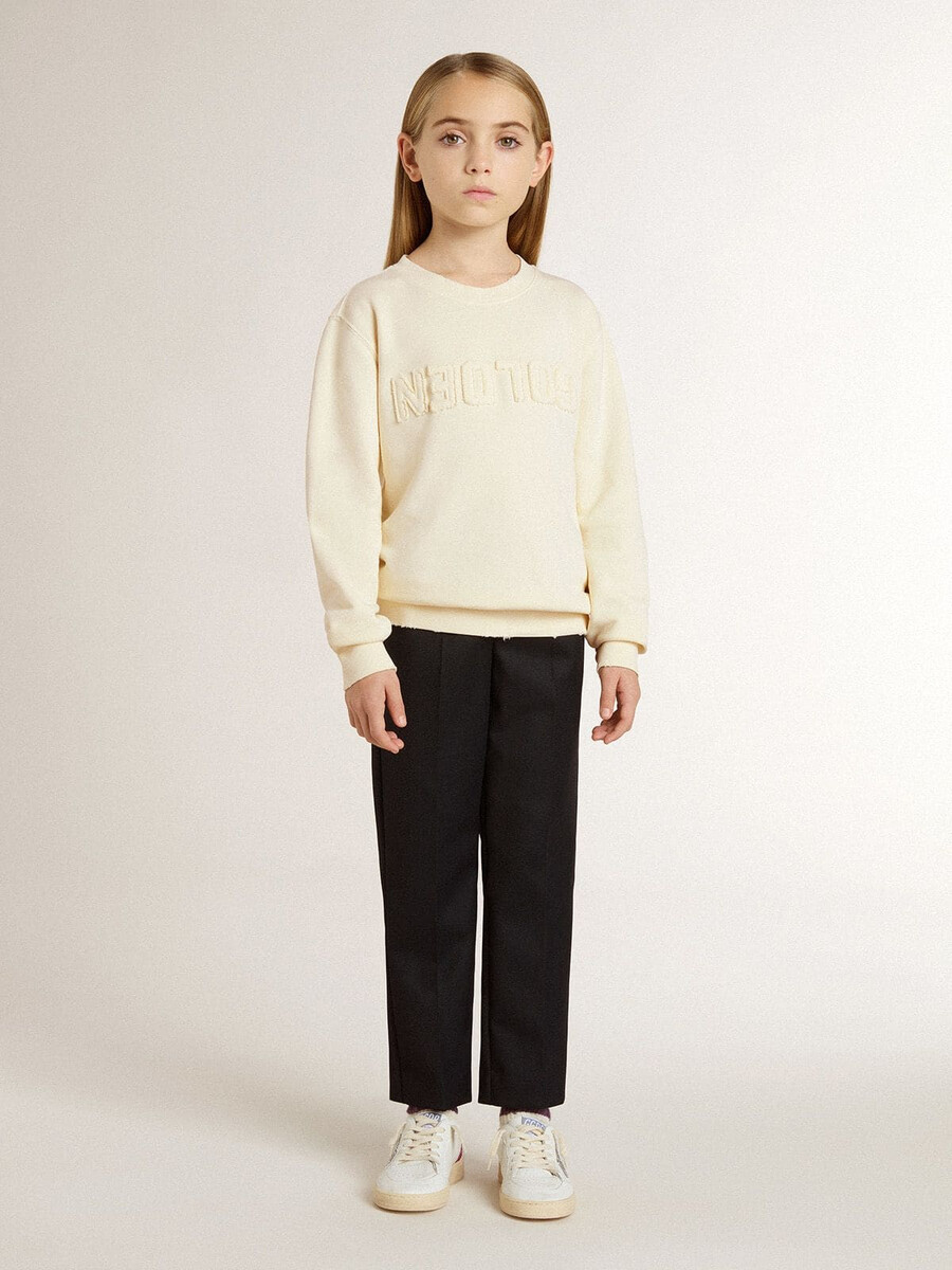 crèmekleurig sweatshirt voor meisjes met opdruk.