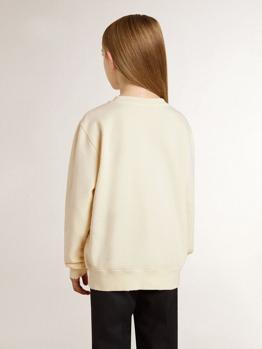 crèmekleurig sweatshirt voor meisjes met opdruk.
