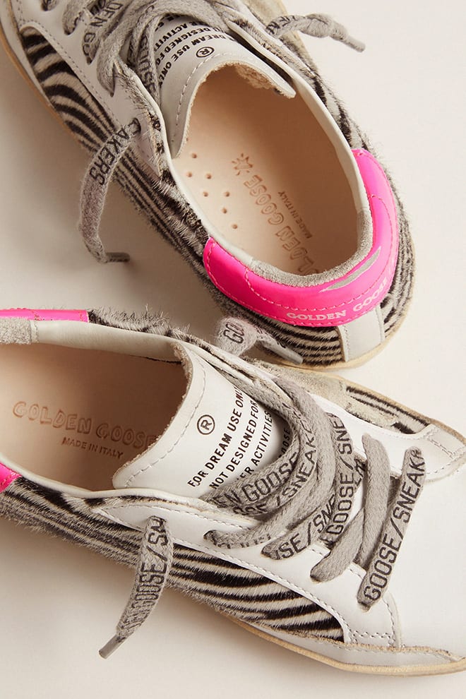 junior super-star in leer en zebraprint ponyhuid met fuchsia hielstuk