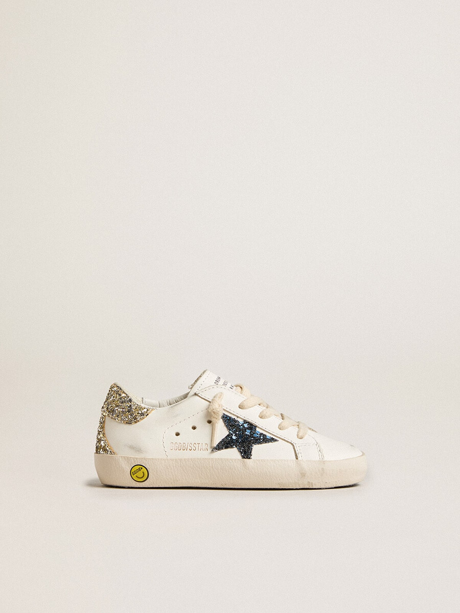 junior super-star in leer met glitterster en hielstuk.