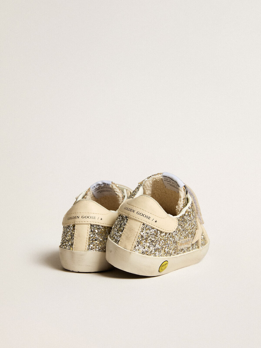 old school junior in platina glitter met leren ster en hielstuk.