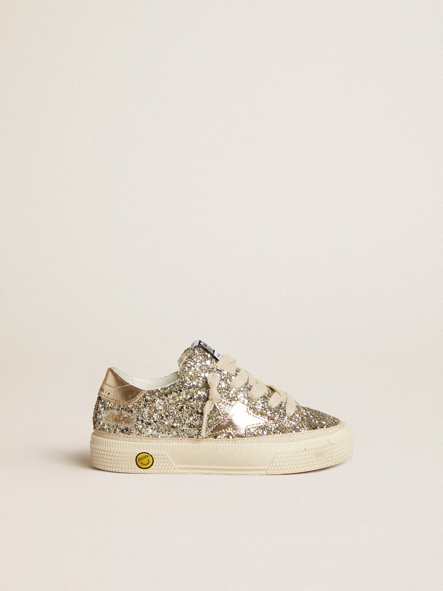 may junior in platina glitter met metallic leren ster en hielstuk.