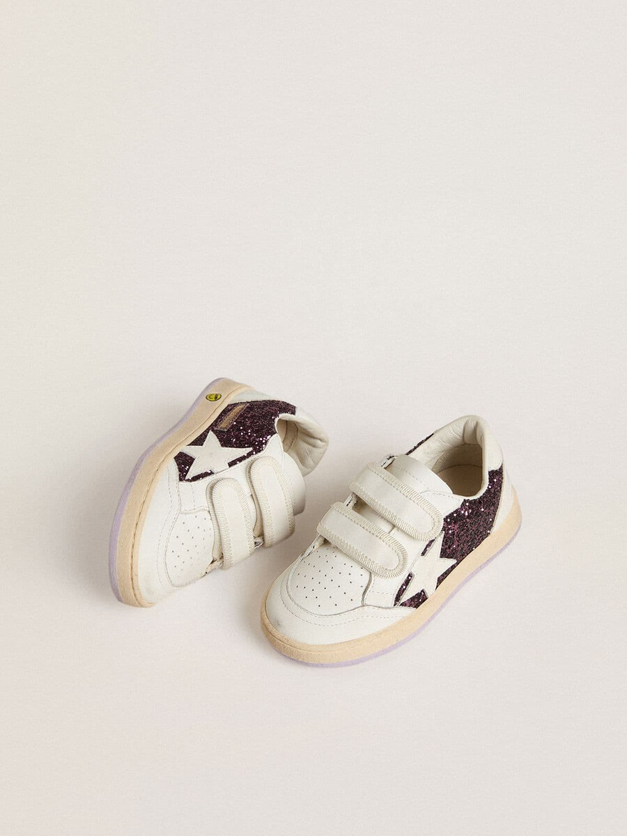 junior ball star in paarse glitter met witte leren ster en hielstuk.