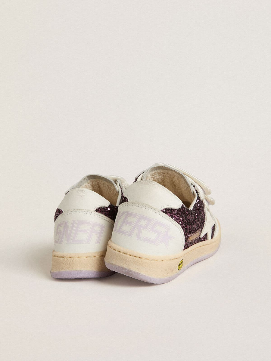 junior ball star in paarse glitter met witte leren ster en hielstuk.