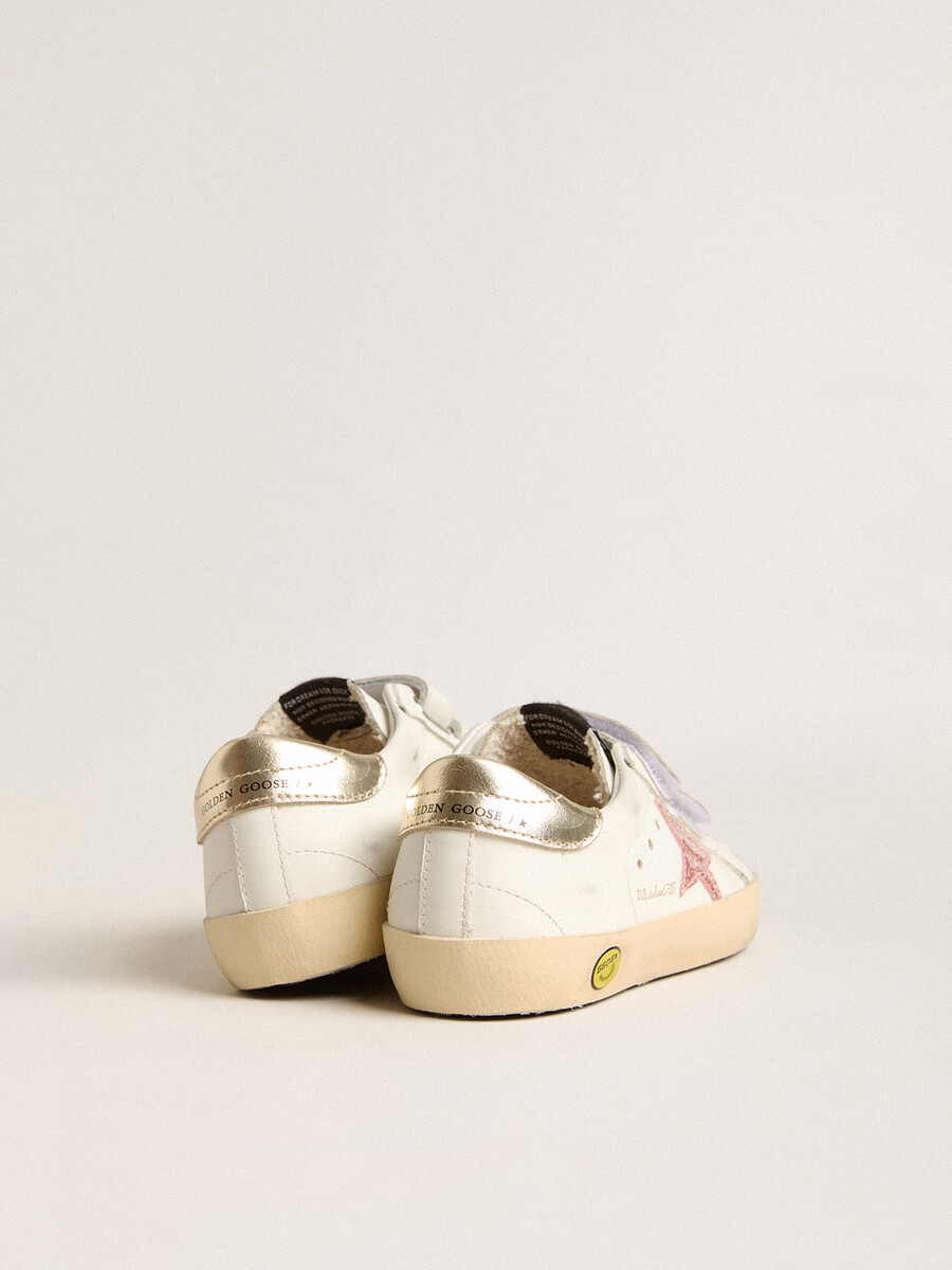 young old school in leer met een metallic perzikkleurige leren ster.