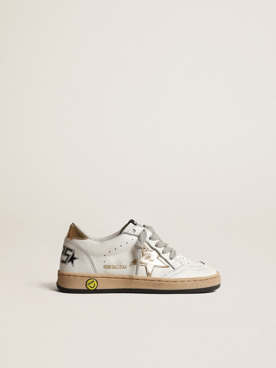 ball star young met gouden metallic leren ster en hielstuk.
