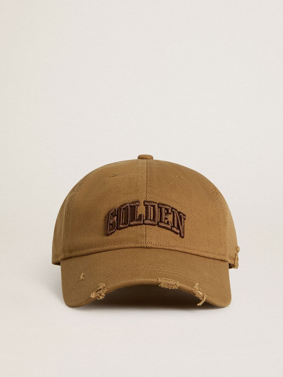 beige katoenen baseballpet met een gebruikte look.