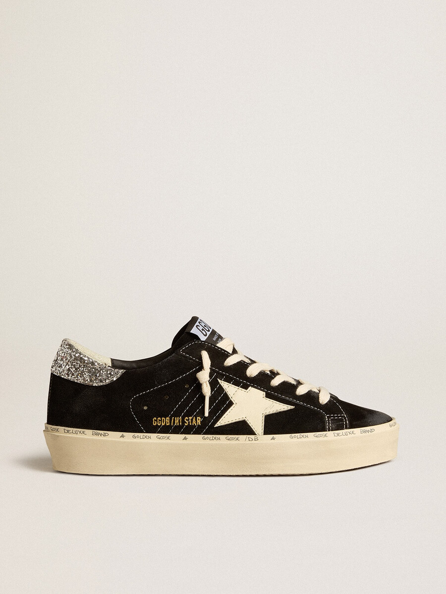 dames hi star in zwart leer met zilverkleurige glitterhak.