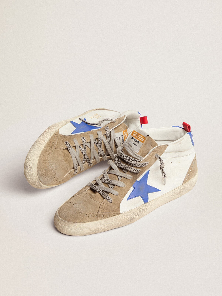 heren mid star met blauwe leren ster en duifgrijze suède inzetstukken.