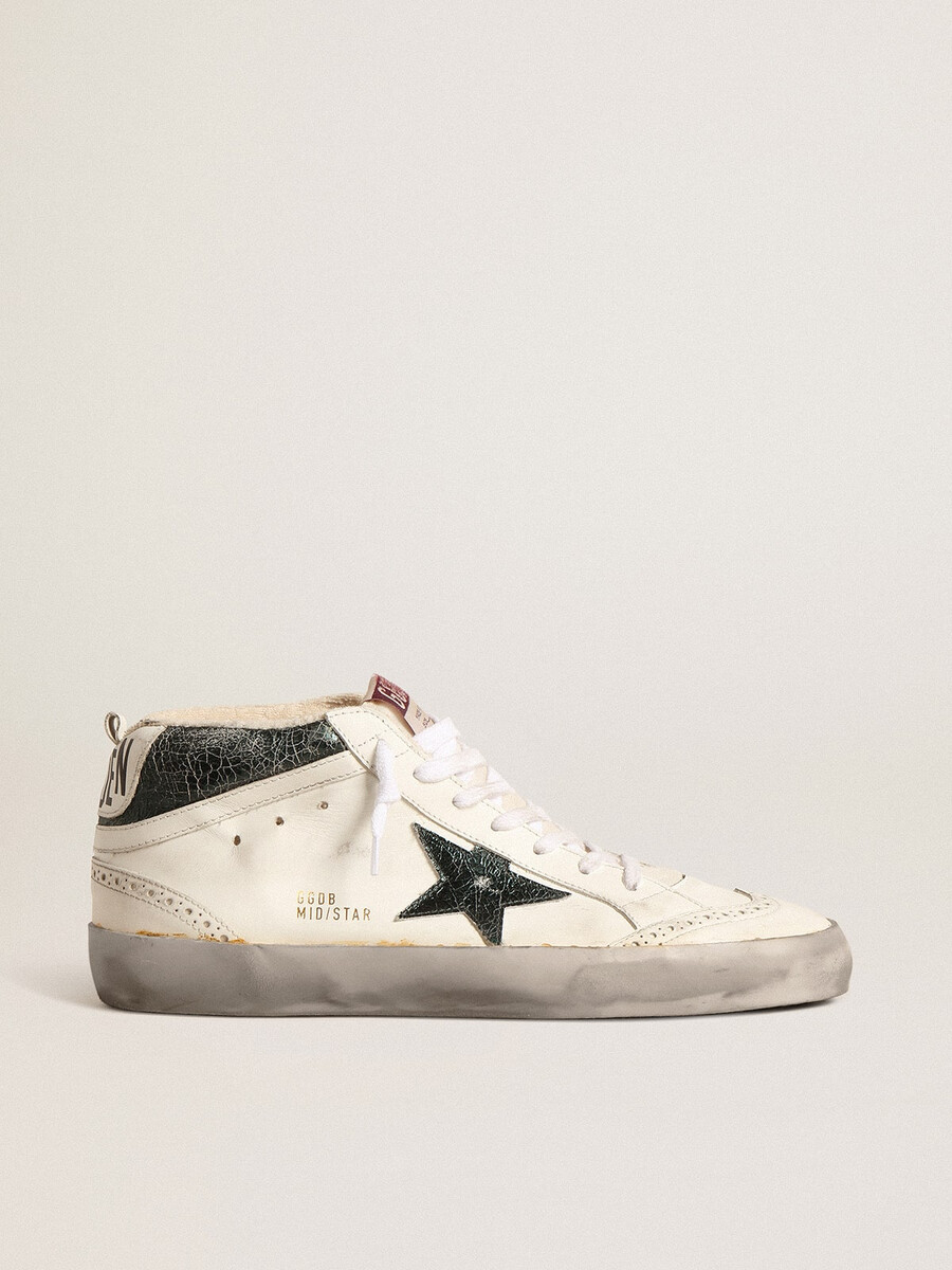 mid star met groene metallic leren ster en witte flits