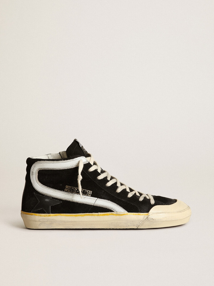 penstar herenslipper in zwart suède met zwarte ster en witte accenten.