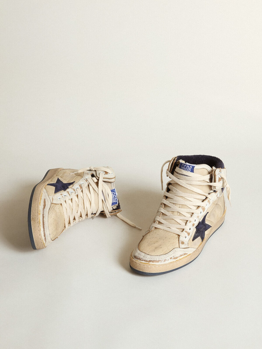 heren sky-star in crèmekleurig nylon en leer met blauwe suède ster