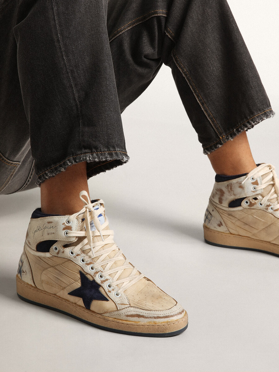 heren sky-star in crèmekleurig nylon en leer met blauwe suède ster