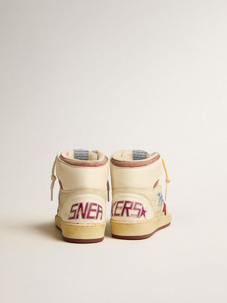 sky-star in beige nylon en nappaleer met een ster van granaatappelkleurig suède.